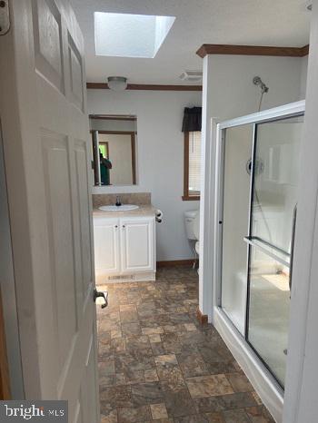 1296 Rawlinsville Road New Providence, PA 17560 - Photo 7 of 8 a bathroom with a sink and mirror