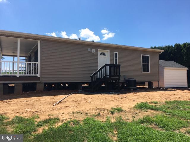 1296 Rawlinsville Road New Providence, PA 17560 - Photo 8 of 8 a view of a house with snow on the side of the road