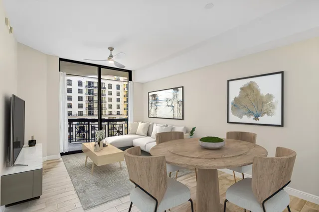 a view of a dining room with furniture window and outside view