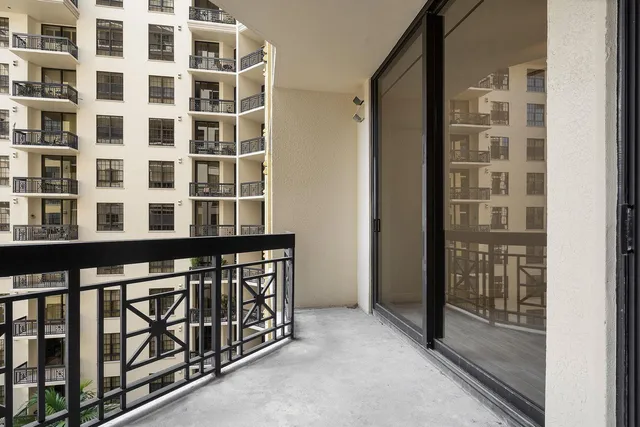 a kitchen with granite countertop a stove and a sink