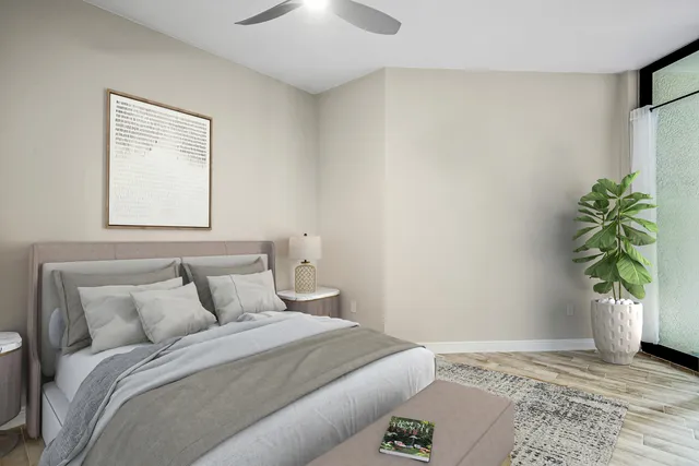 a view of a kitchen with a sink and a refrigerator