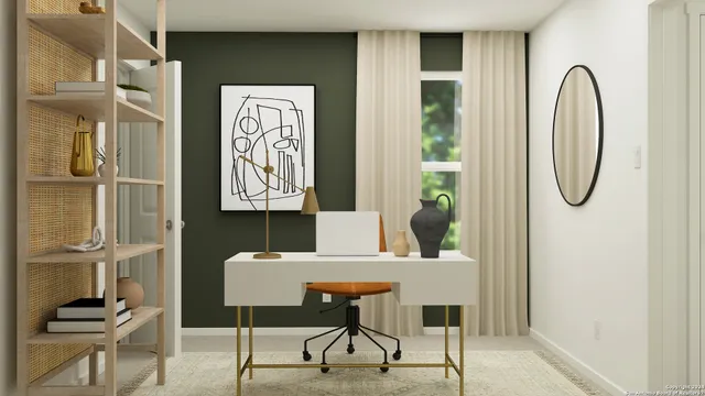 a view of a livingroom with furniture and a potted plant