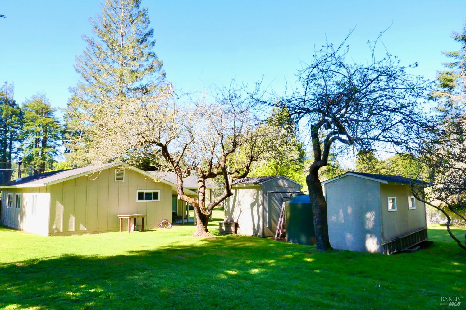 30860 Simpson Lane Fort Bragg, CA 95437 - Photo 24 of 33 a view of a house with a yard