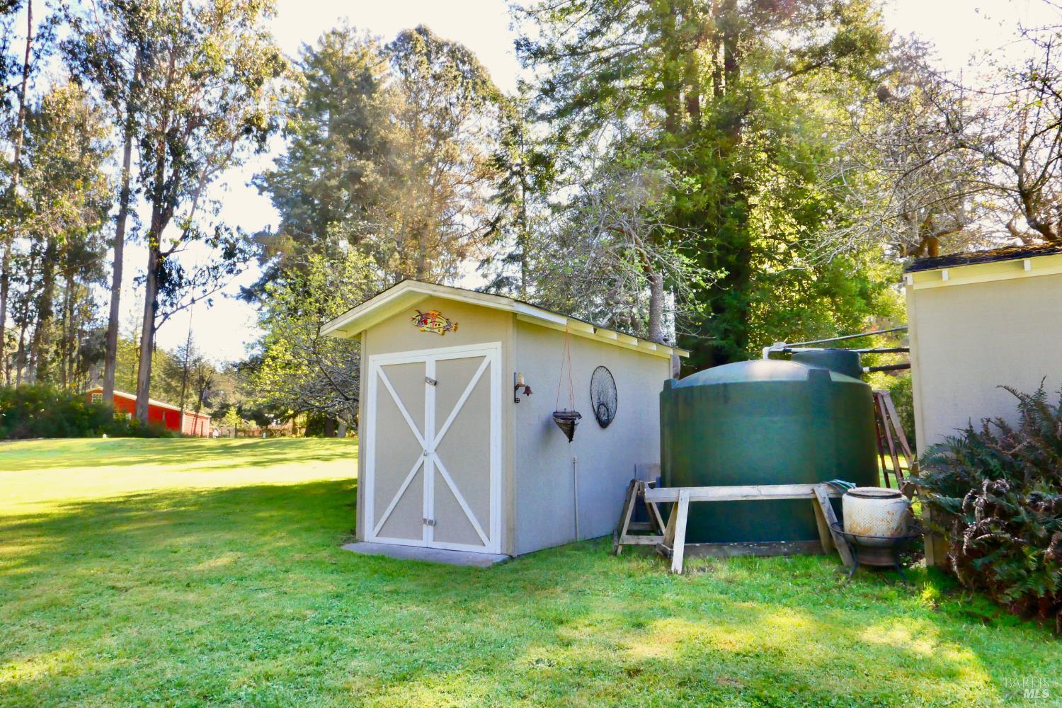 30860 Simpson Lane Fort Bragg, CA 95437 - Photo 29 of 33 a view of a garden with wooden fence