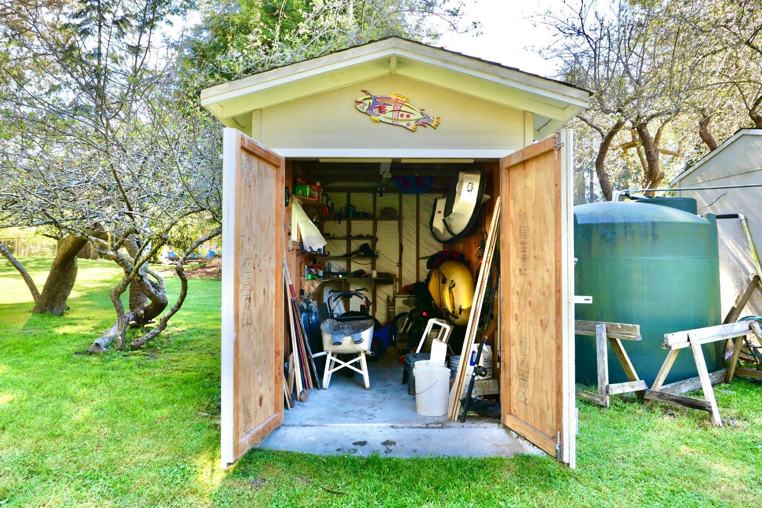 30860 Simpson Lane Fort Bragg, CA 95437 - Photo 30 of 33 a view of a dinning area with swimming pool and a yard