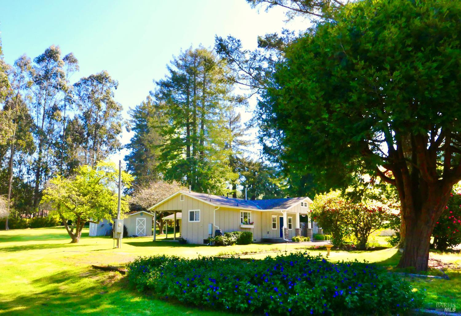 30860 Simpson Lane Fort Bragg, CA 95437 - Photo 4 of 33 a view of large house with a big yard and large trees