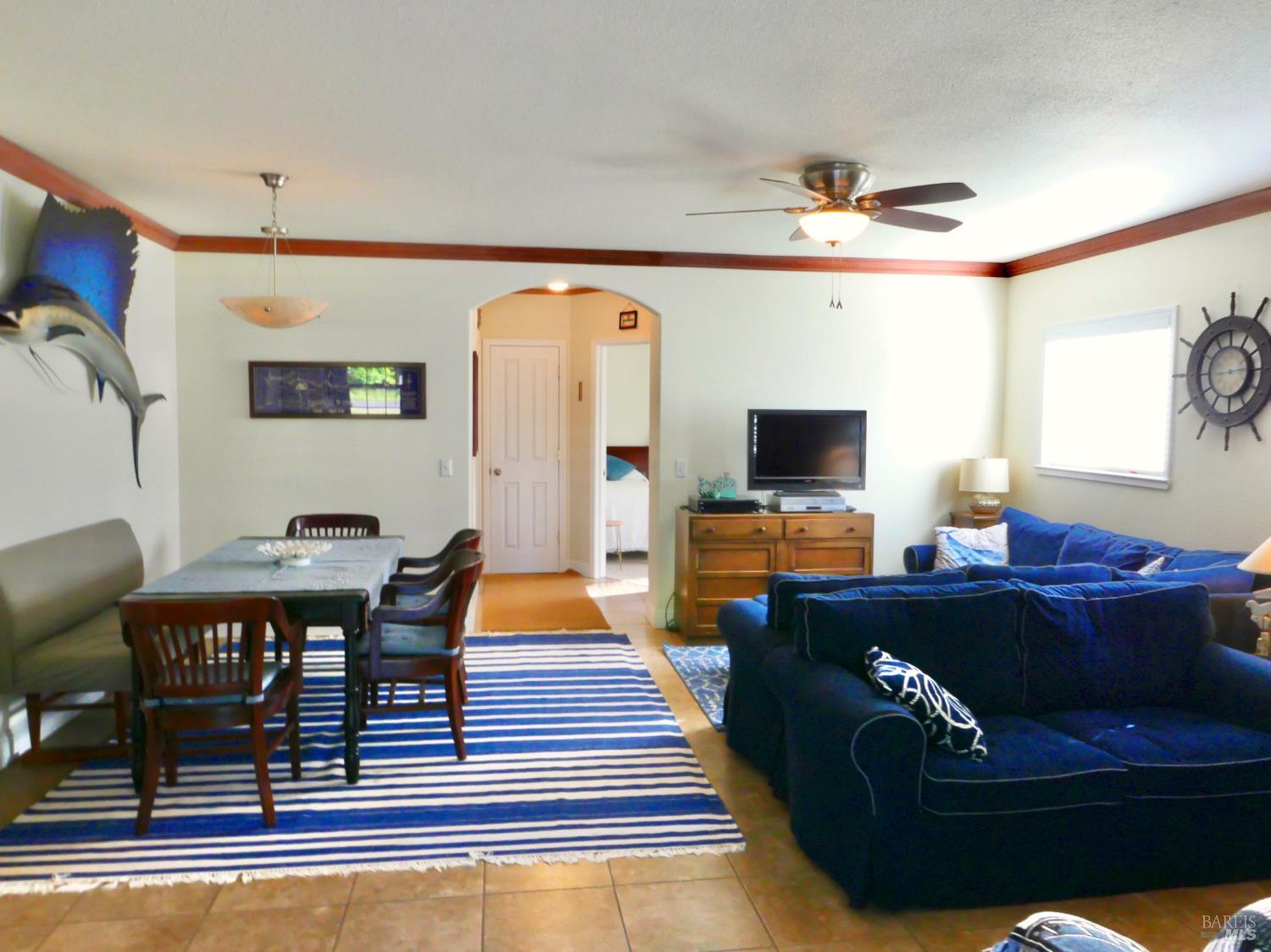 30860 Simpson Lane Fort Bragg, CA 95437 - Photo 9 of 33 a living room with furniture and a flat screen tv
