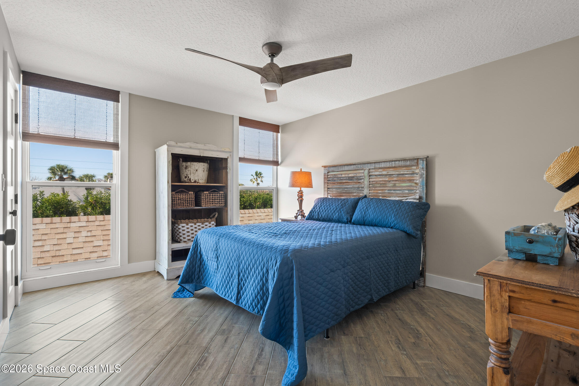 700 Wave Crest Avenue, Unit 206 Indialantic, FL 32903 - Photo 26 of 36 a bed room with a bed and a window