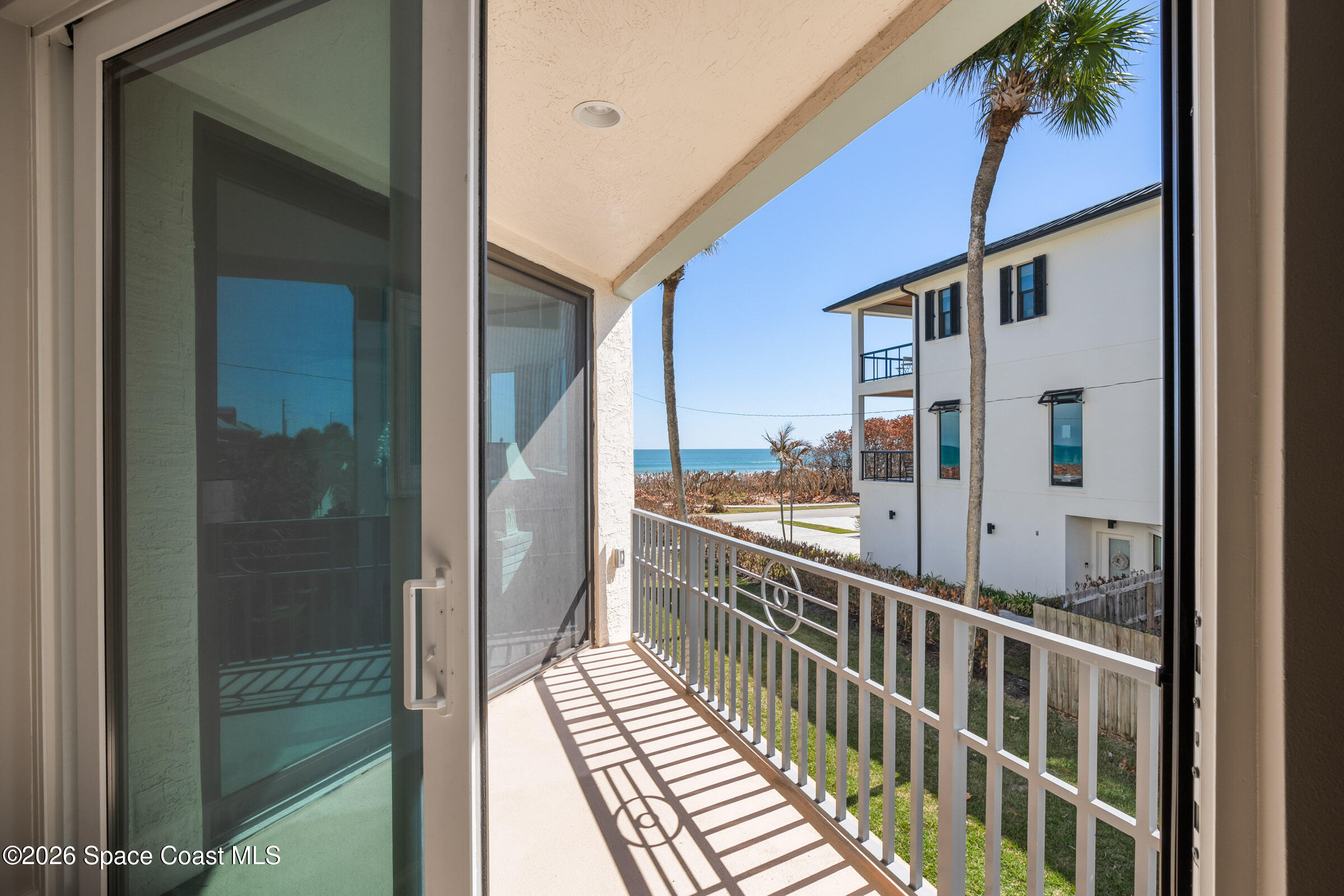 700 Wave Crest Avenue, Unit 206 Indialantic, FL 32903 - Photo 32 of 36 a view of balcony with a potted plant