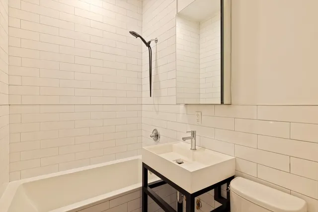 a bathroom with a sink and a bathtub