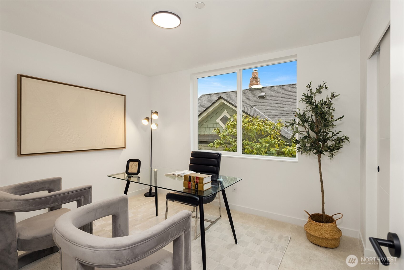 2340 North 64th Street, Unit A Seattle, WA 98103 - Photo 13 of 29 a living room with furniture and a potted plant