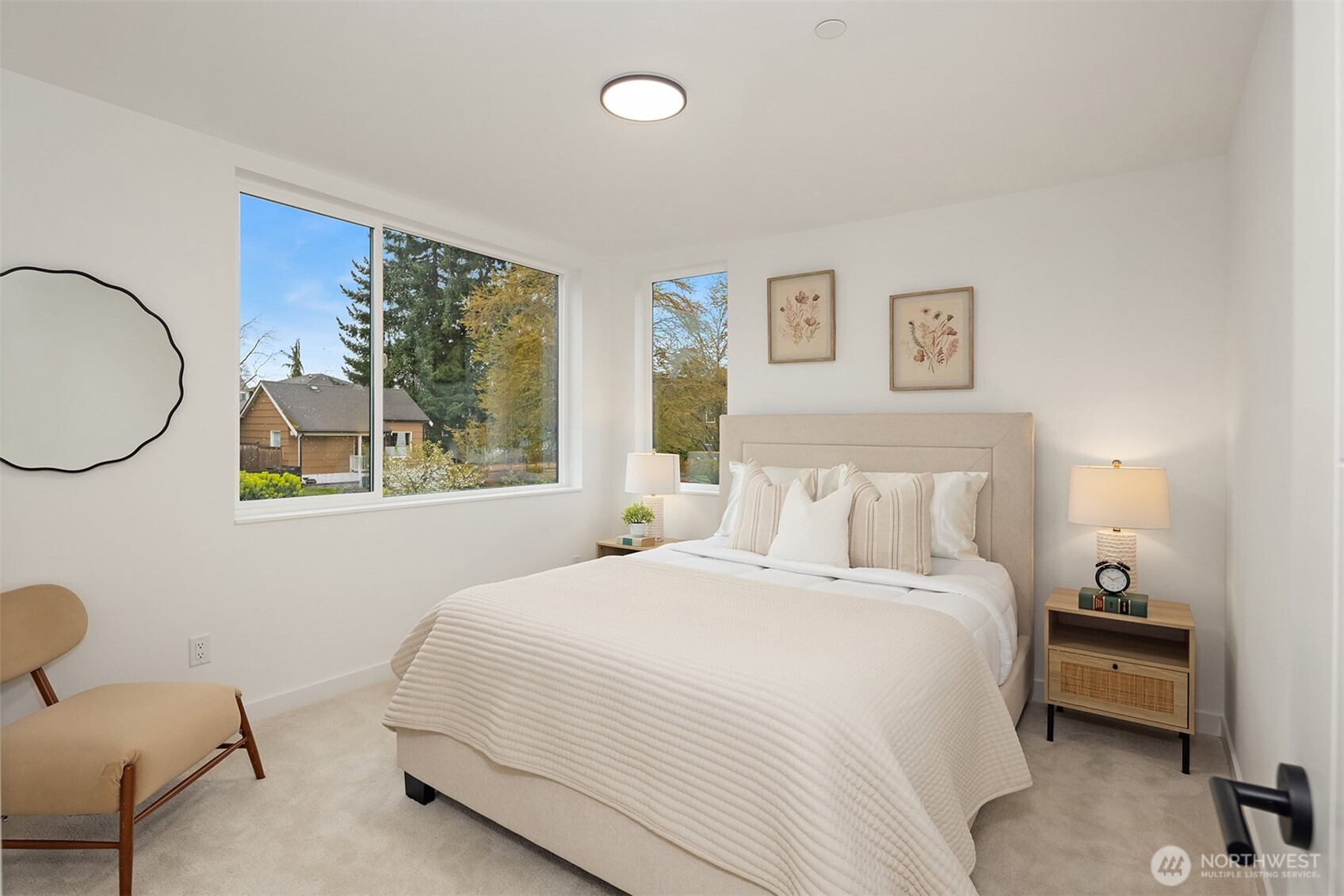 2340 North 64th Street, Unit A Seattle, WA 98103 - Photo 14 of 29 a bedroom with a bed chair and a window