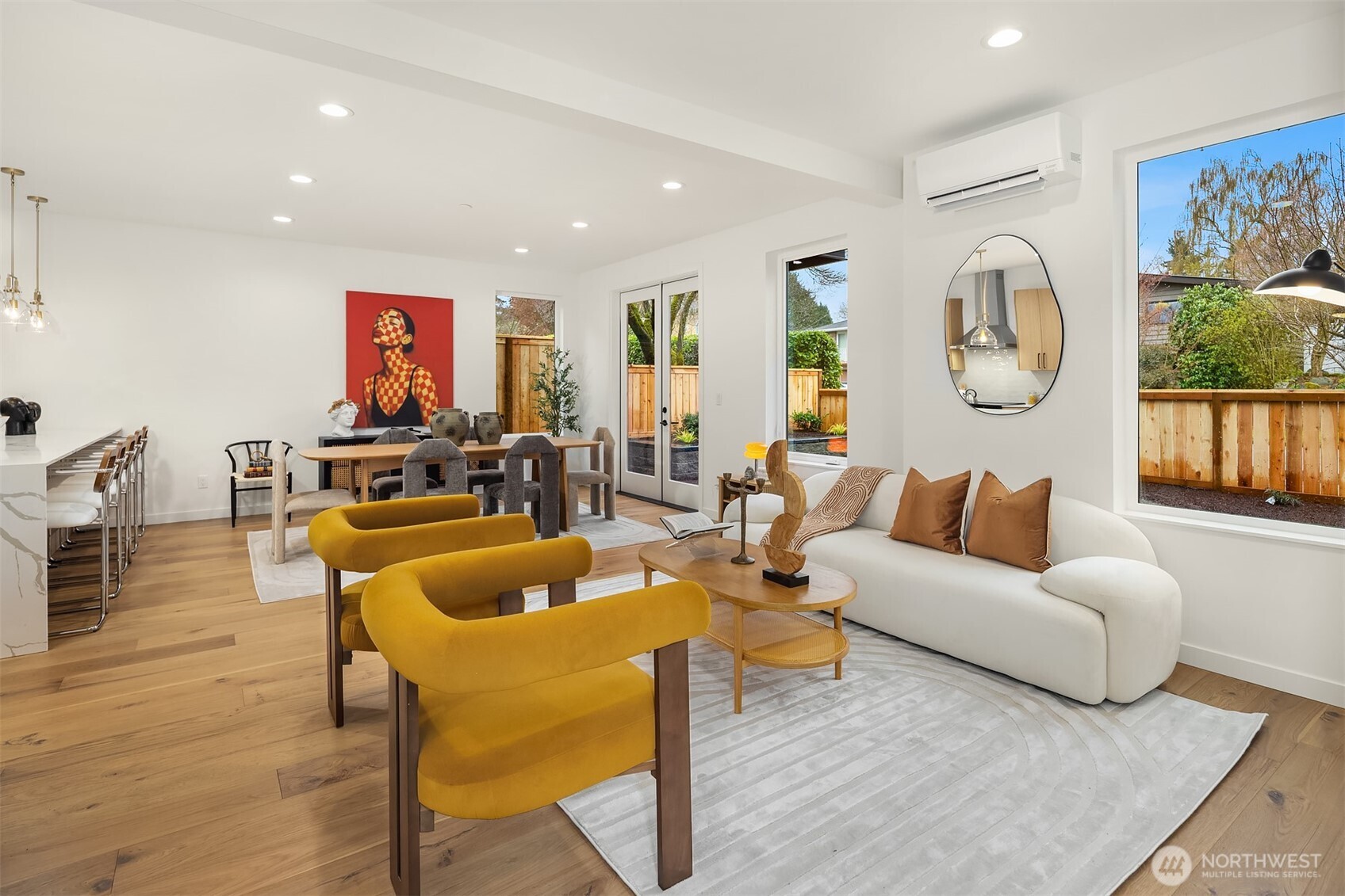 2340 North 64th Street, Unit A Seattle, WA 98103 - Photo 3 of 29 a living room with furniture and wooden floor