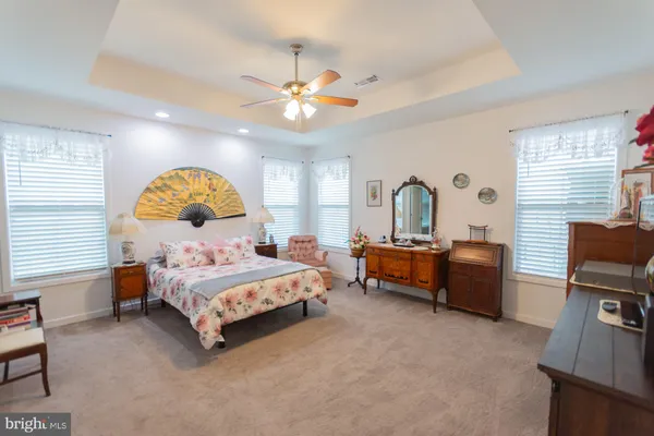 a bedroom with a bed and furniture