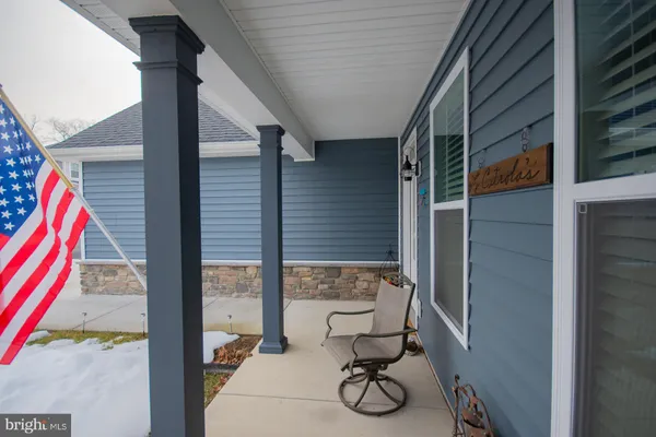 a view of a patio with swimming pool