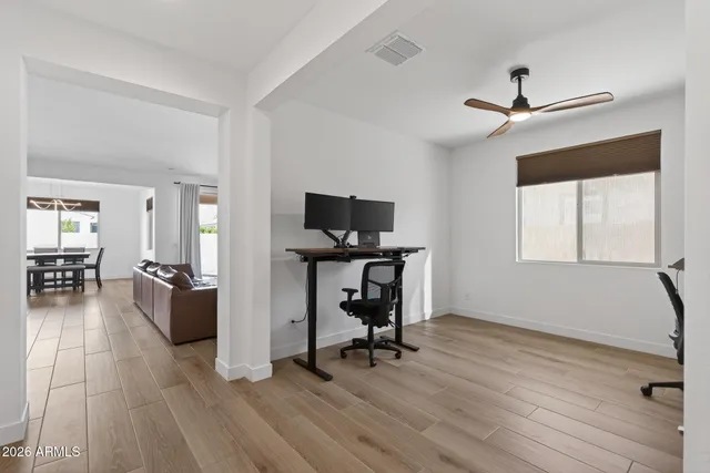 a kitchen with granite countertop a stove and a sink