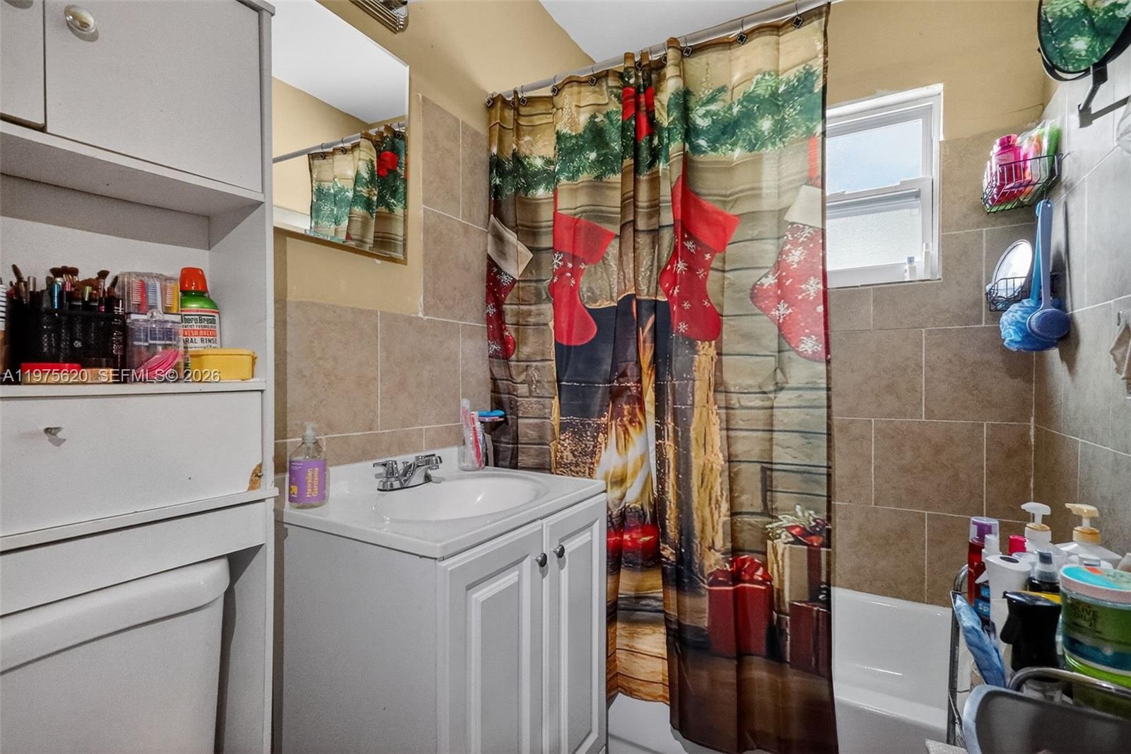 834 Northwest 115th Street Miami, FL 33168 - Photo 32 of 46 a utility room with dryer and washer