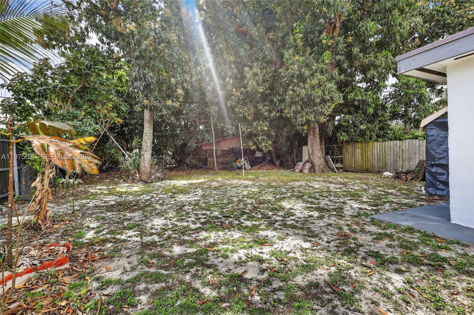 834 Northwest 115th Street Miami, FL 33168 - Photo 42 of 46 a backyard of a house