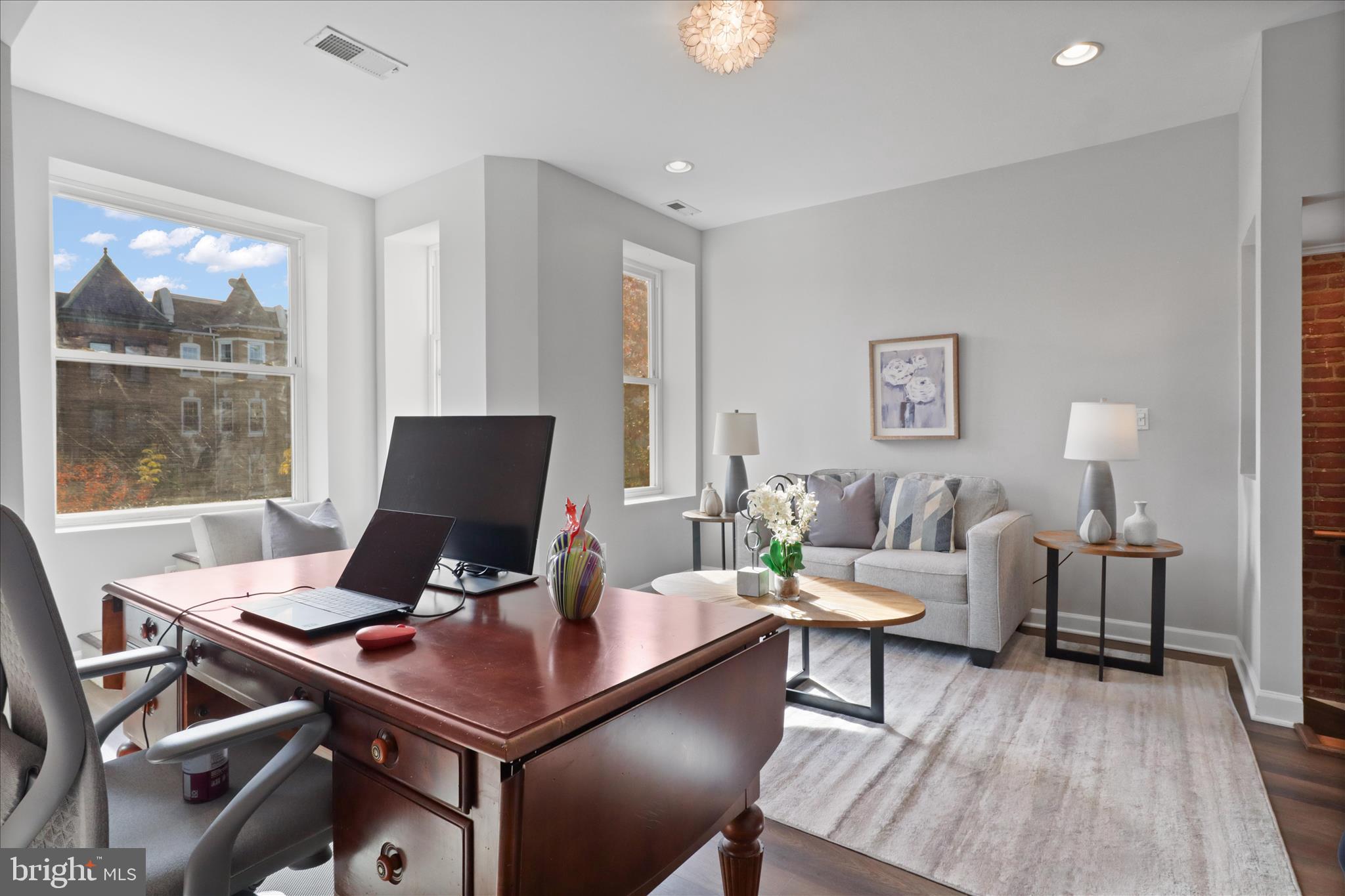 1327 Harvard Street Northwest Washington, DC 20009 - Photo 21 of 61 a living room with furniture and window