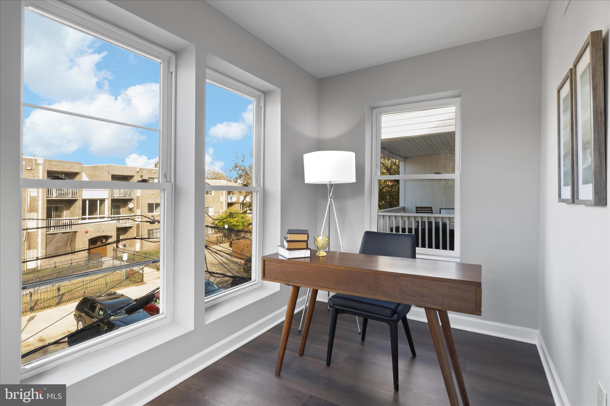 1327 Harvard Street Northwest Washington, DC 20009 - Photo 27 of 61 a dining room with furniture and wooden floor