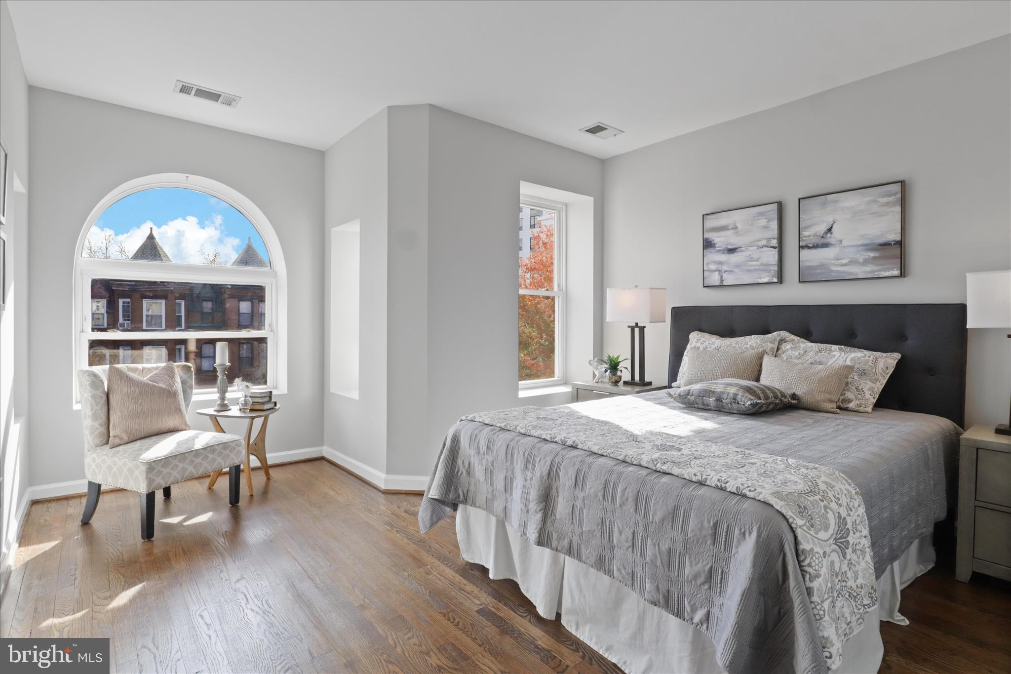 1327 Harvard Street Northwest Washington, DC 20009 - Photo 39 of 61 a bedroom with a bed and a window