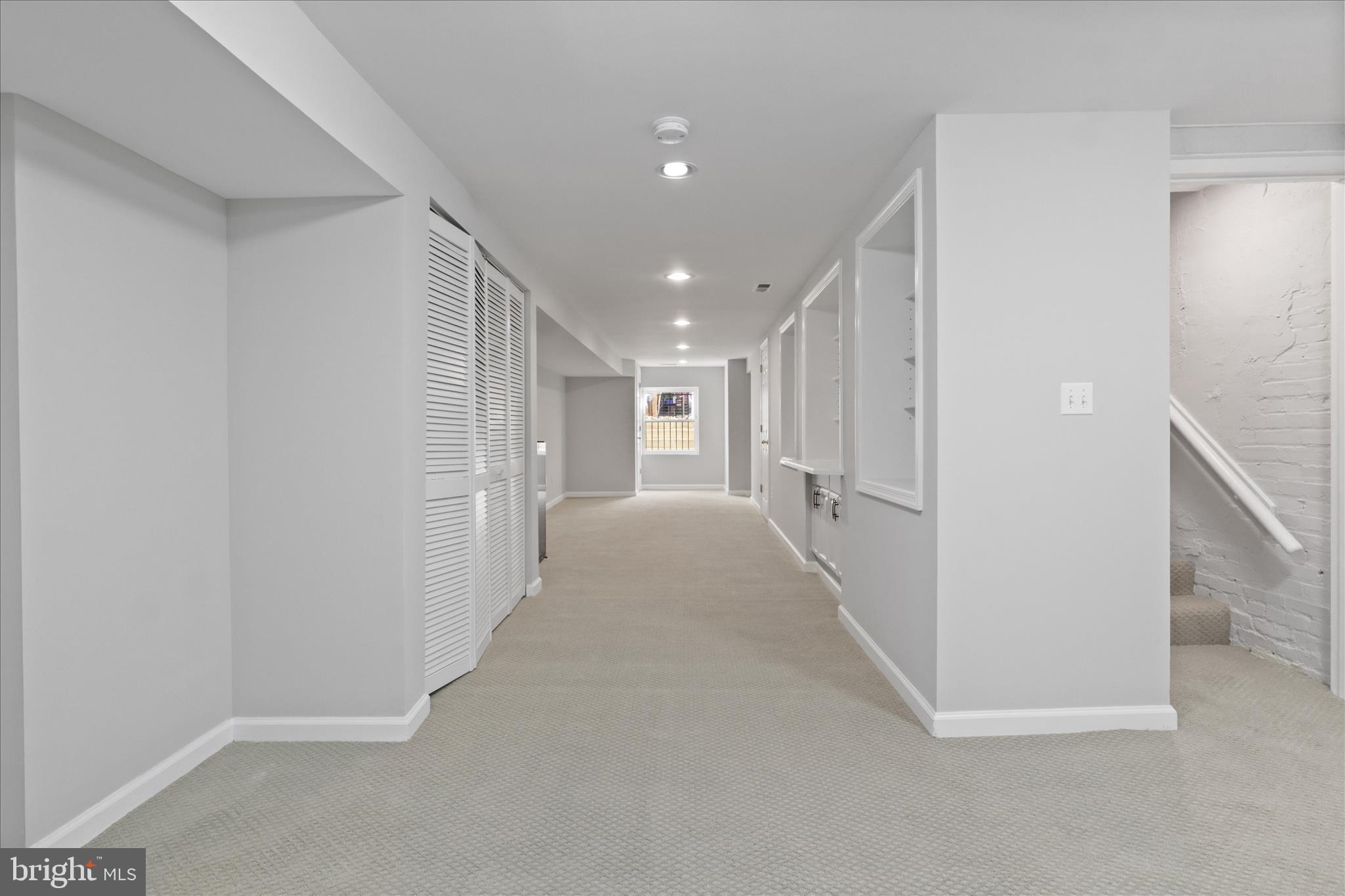 1327 Harvard Street Northwest Washington, DC 20009 - Photo 43 of 61 Lower w/new carpet & paint w/ Custom Built Ins