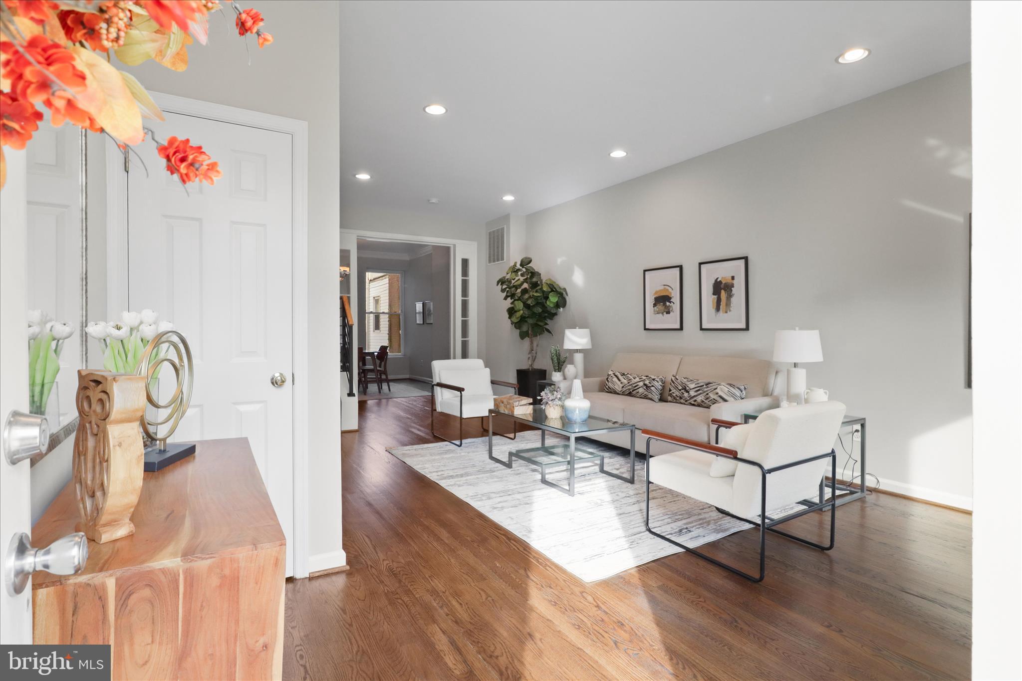 1327 Harvard Street Northwest Washington, DC 20009 - Photo 5 of 61 a living room with furniture and a wooden floor