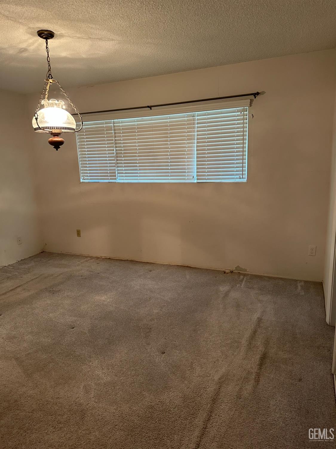 Undisclosed Address Bakersfield, CA 93306 - Photo 15 of 24 a view of wooden floor and windows in a room
