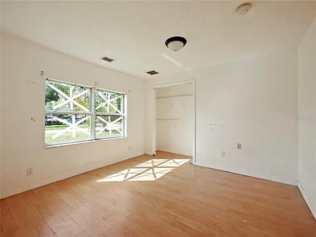 an empty room with windows