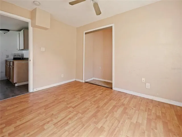 a view of an empty room and window