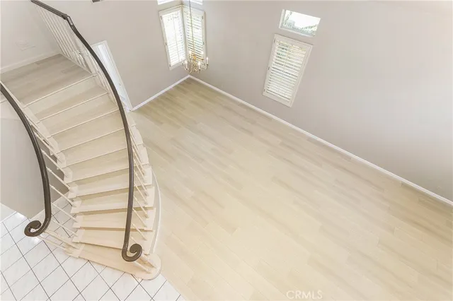 a view of empty room with windows