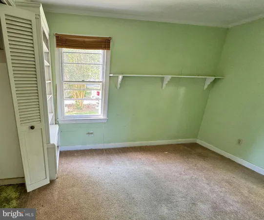 a view of a room that has a window in it