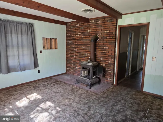 a view of a workspace with furniture