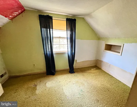 an empty room with window