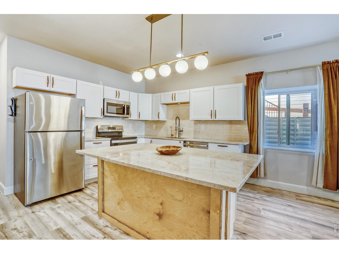 7154 Howell Street Arvada, CO 80004 - Photo 22 of 36 Lower Level Kitchen