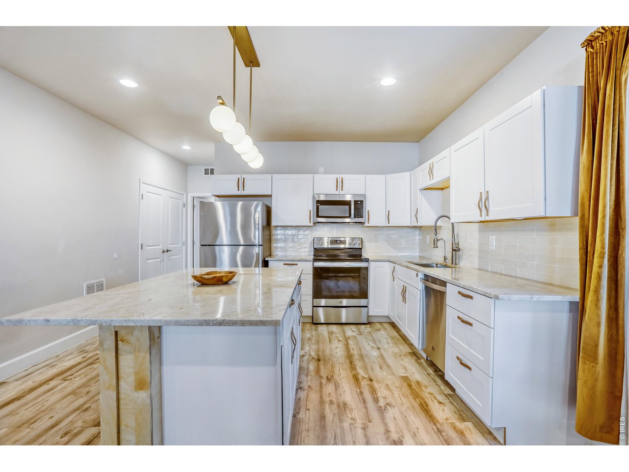 7154 Howell Street Arvada, CO 80004 - Photo 23 of 36 Lower Level Kitchen
