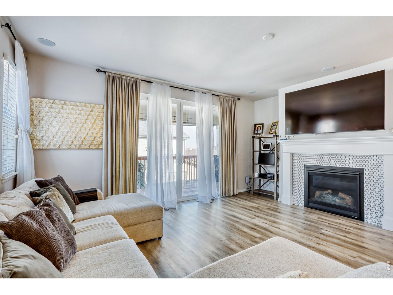 7154 Howell Street Arvada, CO 80004 - Photo 6 of 36 Living Room w/Fireplace