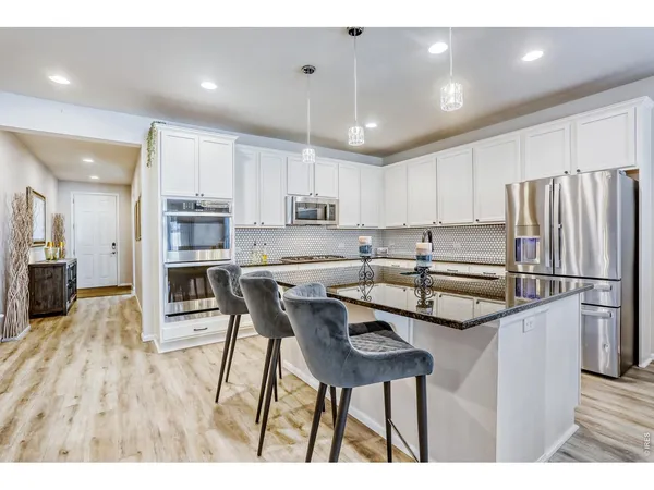 $890,000 | 7154 Howell Street, Arvada, CO 80004
