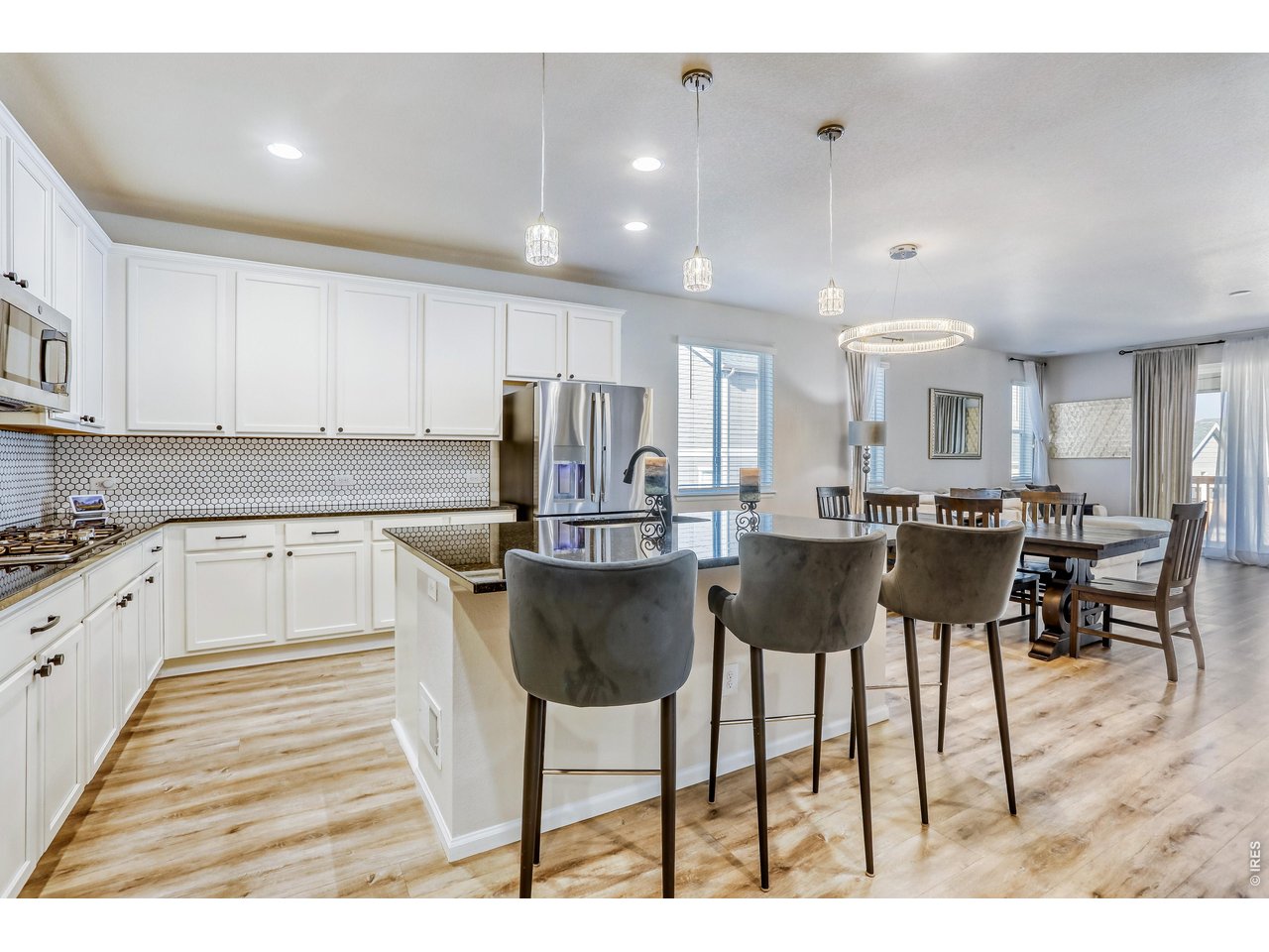7154 Howell Street Arvada, CO 80004 - Photo 10 of 36 Kitchen Breakfast Bar