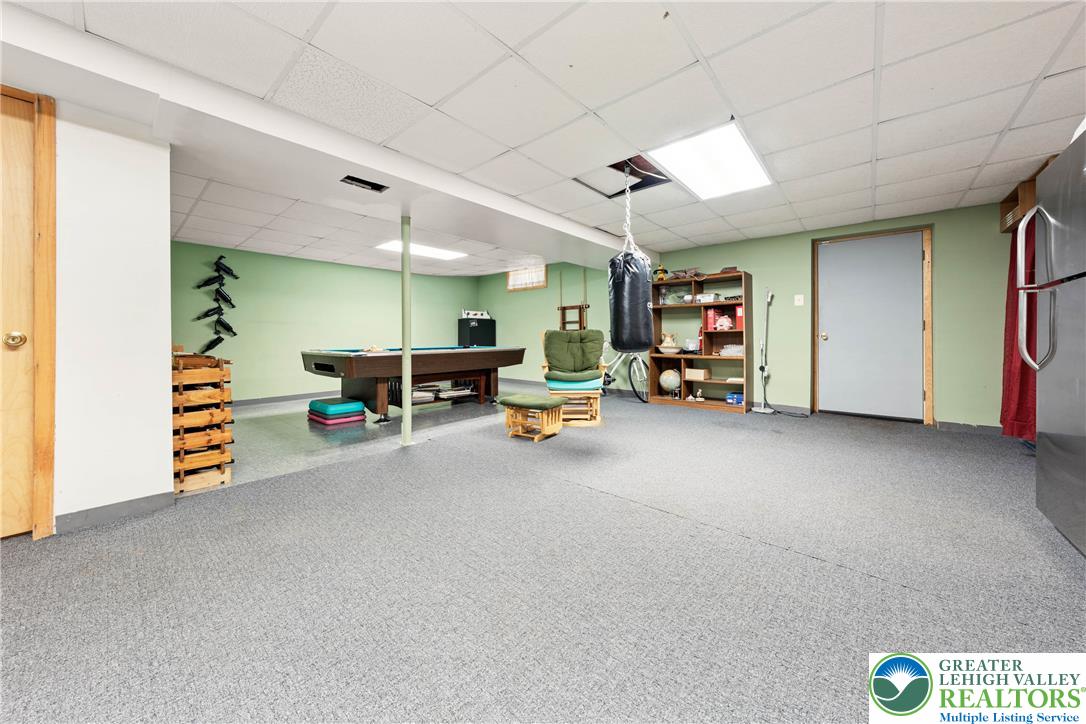 947 Tamenend Road Bath, PA 18014 - Photo 30 of 61 A spacious recreation room, offering ample space for leisure activities.