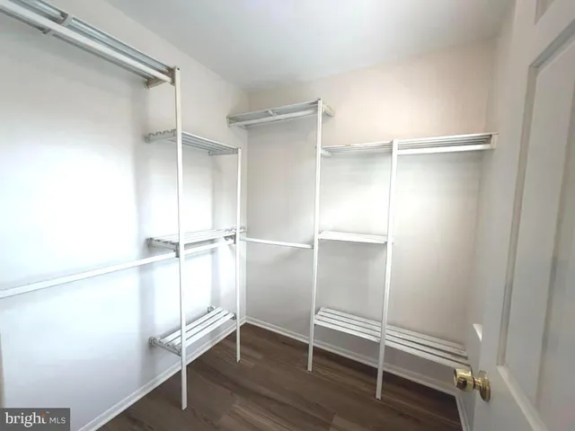 a view of an empty walk in closet