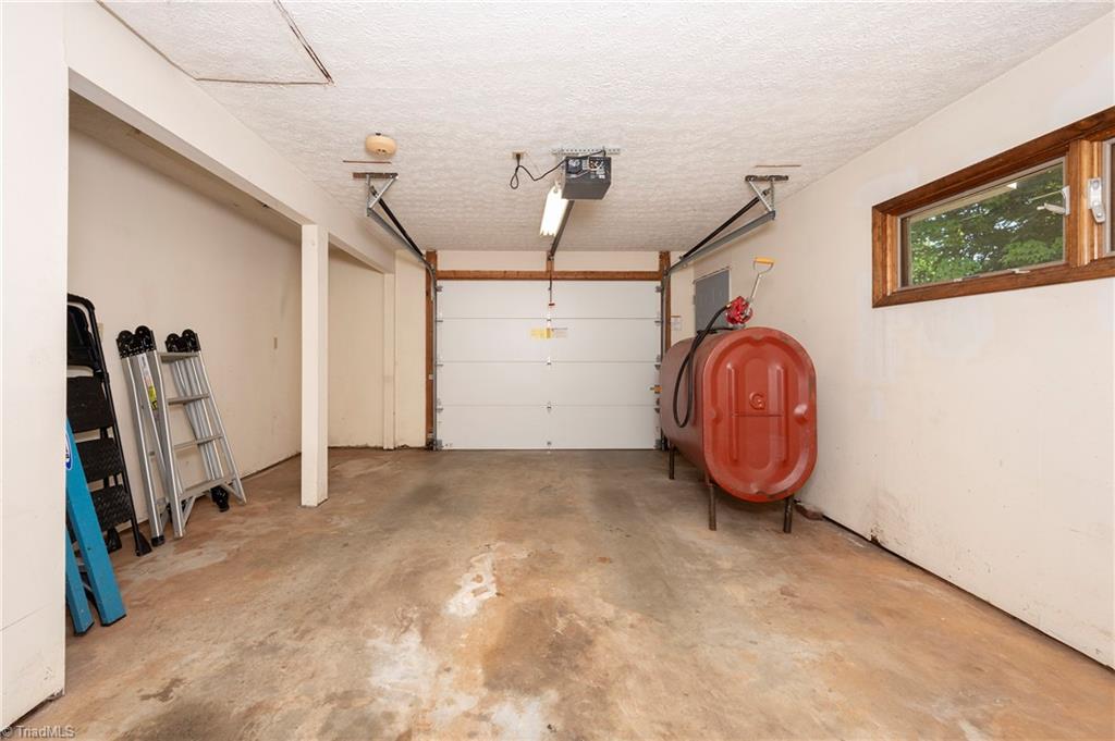 6676 Styers Ferry Road Clemmons, NC 27012 - Photo 34 of 36 Garage- Tank will be removed
