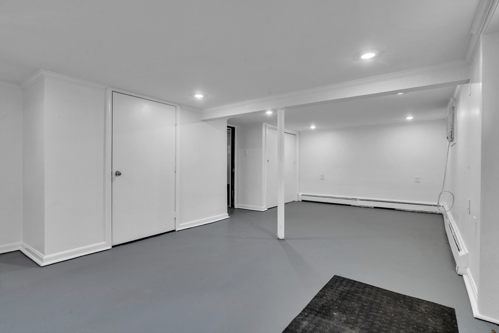 18 Butler Street Revere, MA 02151 - Photo 21 of 33 a view of an empty room with a window