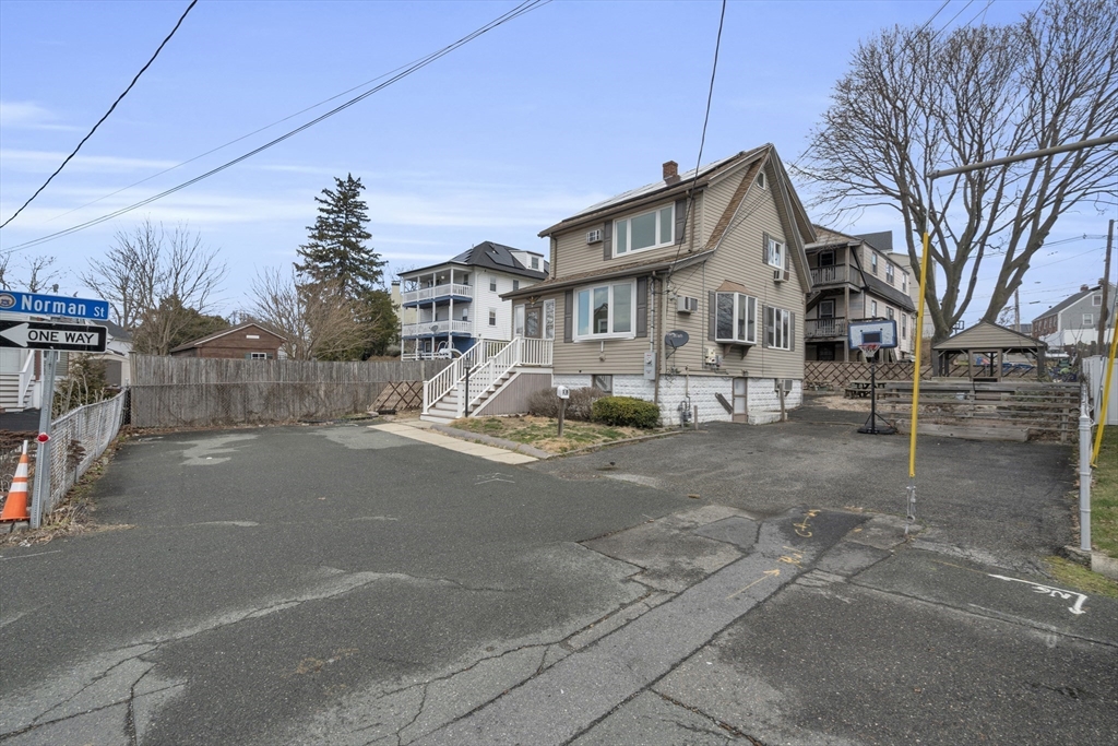18 Butler Street Revere, MA 02151 - Photo 25 of 33 a street view along with residential houses