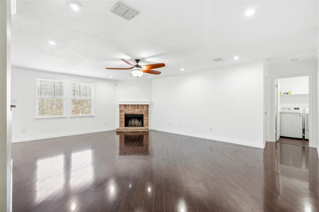3804 McClintick Road McKinney, TX 75070 - Photo 5 of 32 a view of livingroom with hardwood floor and kitchen view