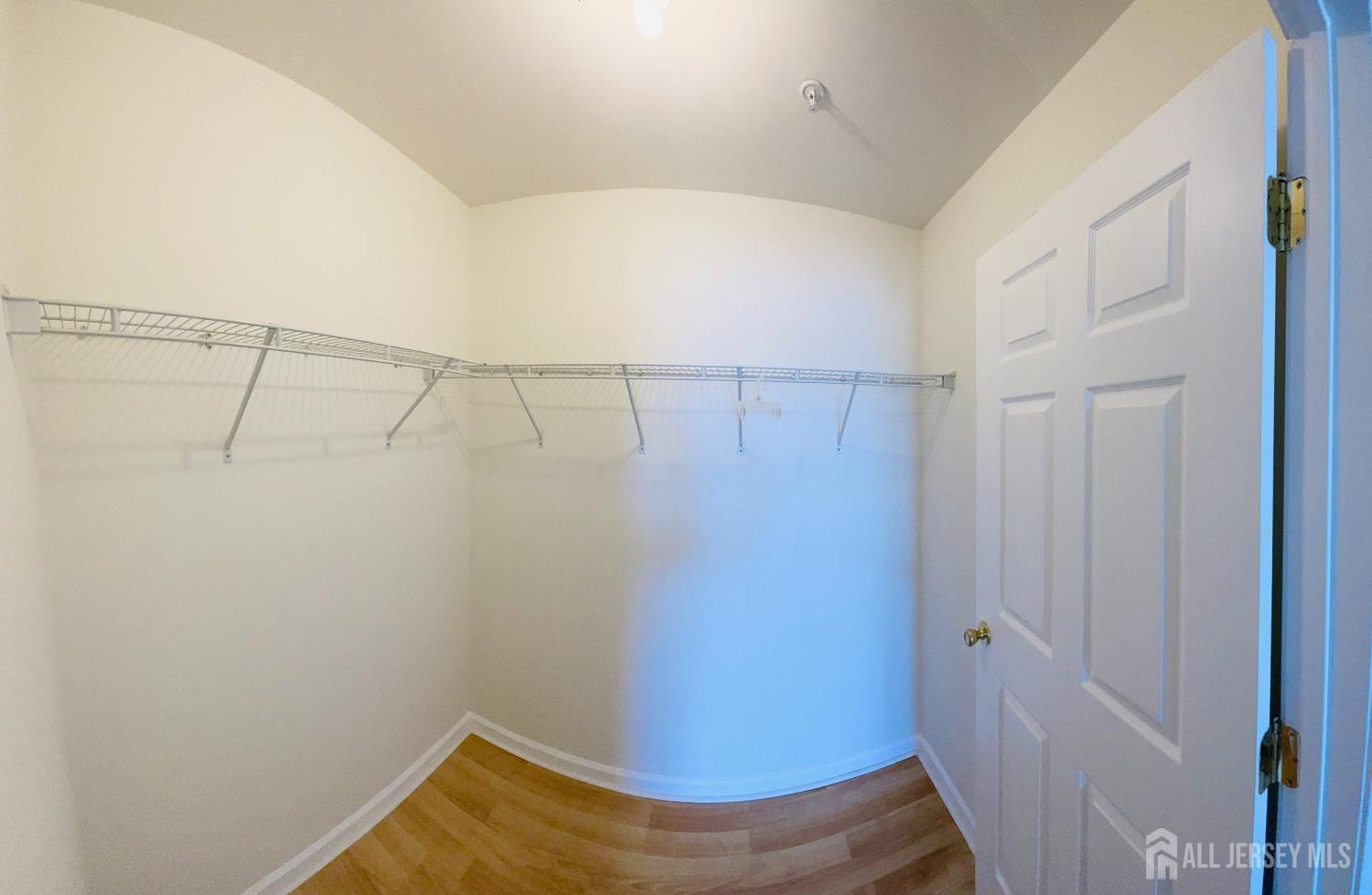 358 Rector Street, Unit 705 Perth Amboy, NJ 08861 - Photo 11 of 11 a view of a room with racks on the wall