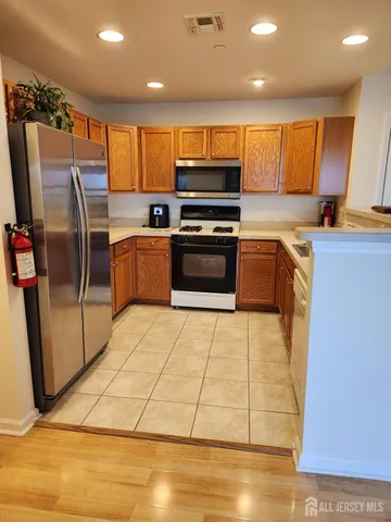 a room with gym equipment and a table