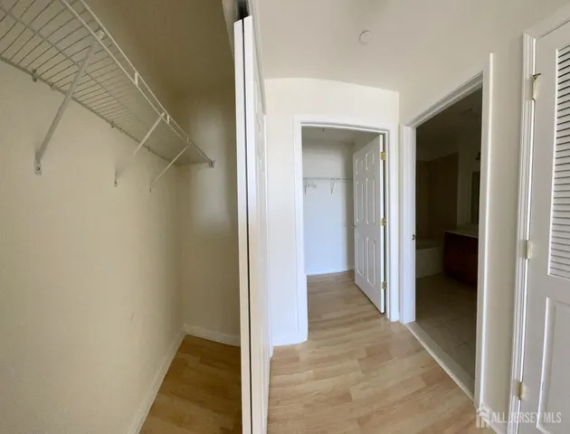 a view of a room with racks on the wall