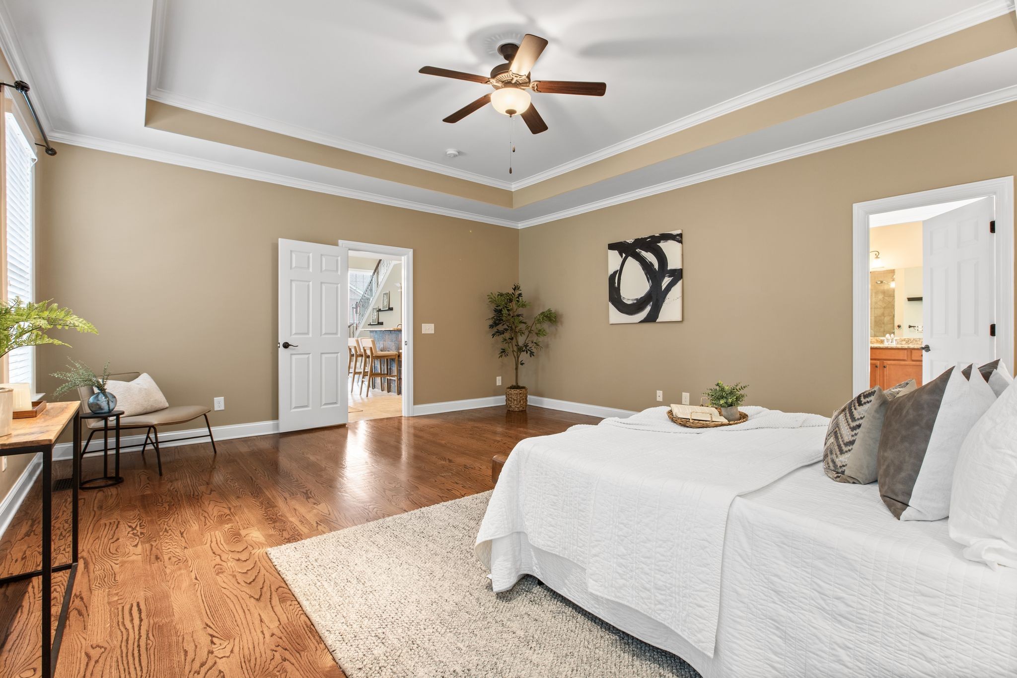 161 Chester Stevens Road Franklin, TN 37067 - Photo 16 of 37 a bedroom with a bed and wooden floor