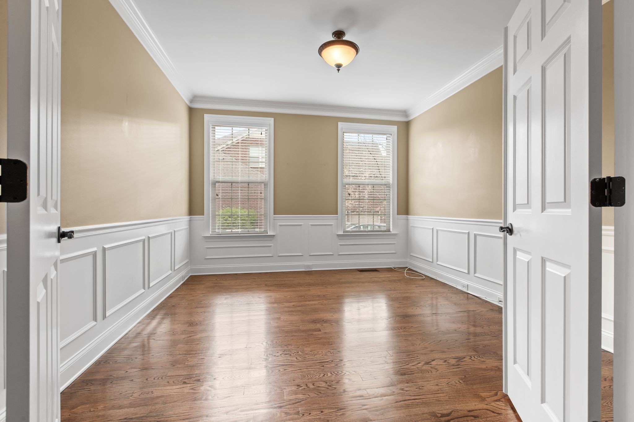 161 Chester Stevens Road Franklin, TN 37067 - Photo 20 of 37 a view of an empty room with wooden floor and a window